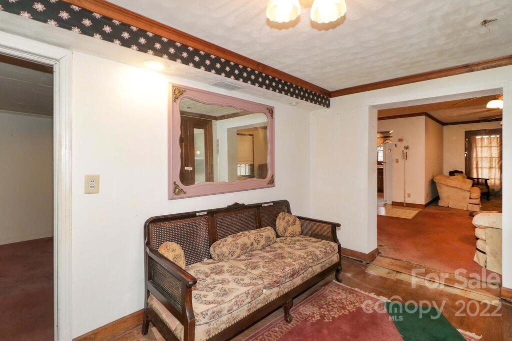 555 Bradshaw Road Salisbury, NC 28147 - Photo 4 of 48 a living room with a couch and wooden floor
