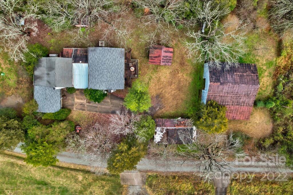 555 Bradshaw Road Salisbury, NC 28147 - Photo 42 of 48 an aerial view of a house with a yard and large trees
