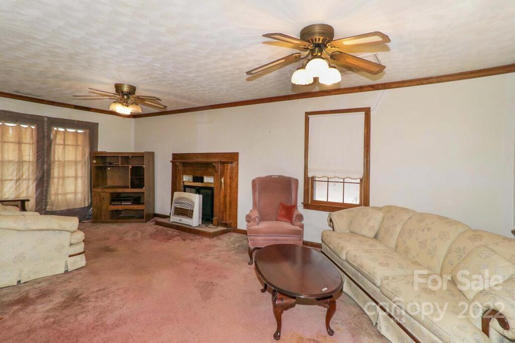 555 Bradshaw Road Salisbury, NC 28147 - Photo 5 of 48 a living room with furniture and a flat screen tv