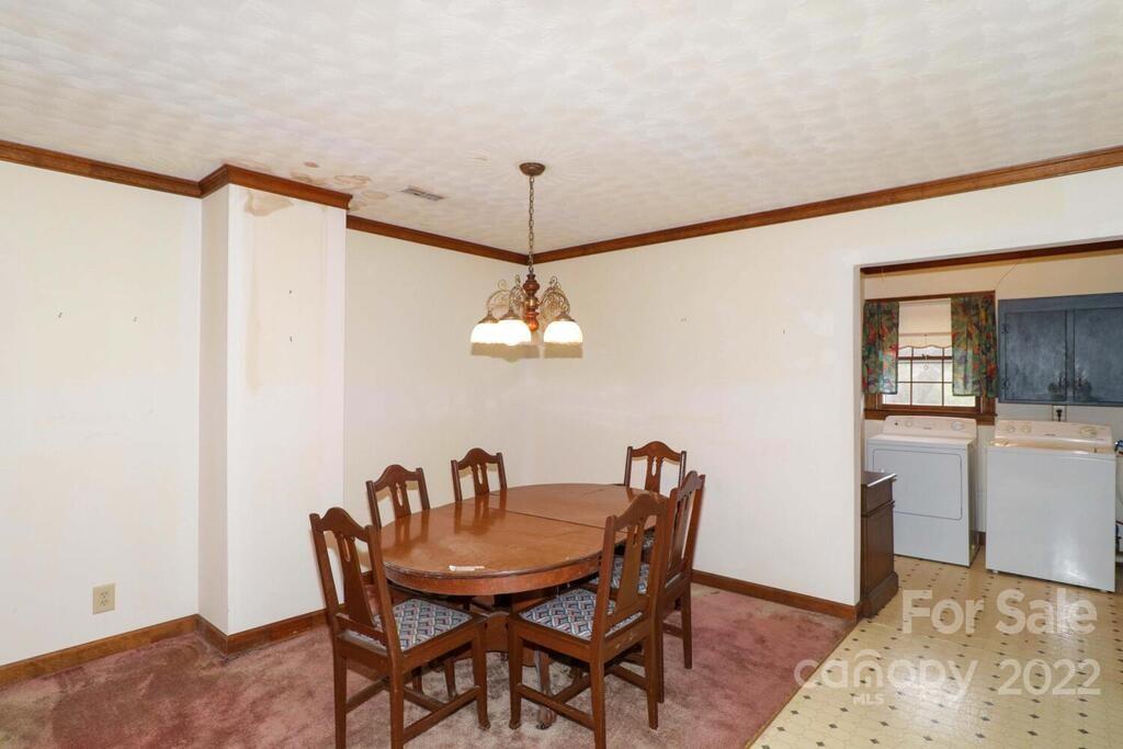 555 Bradshaw Road Salisbury, NC 28147 - Photo 9 of 48 a view of a dining room with furniture and wooden floor