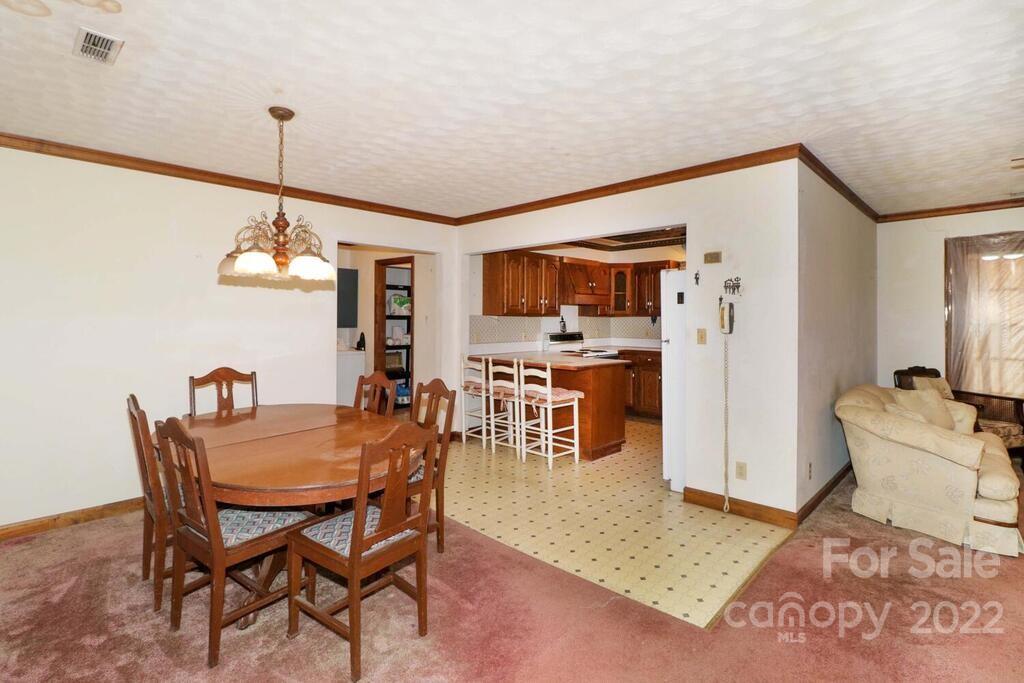 555 Bradshaw Road Salisbury, NC 28147 - Photo 10 of 48 a dining room with furniture and window