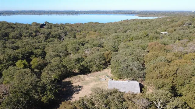 a view of a mountain with a mountain in the background