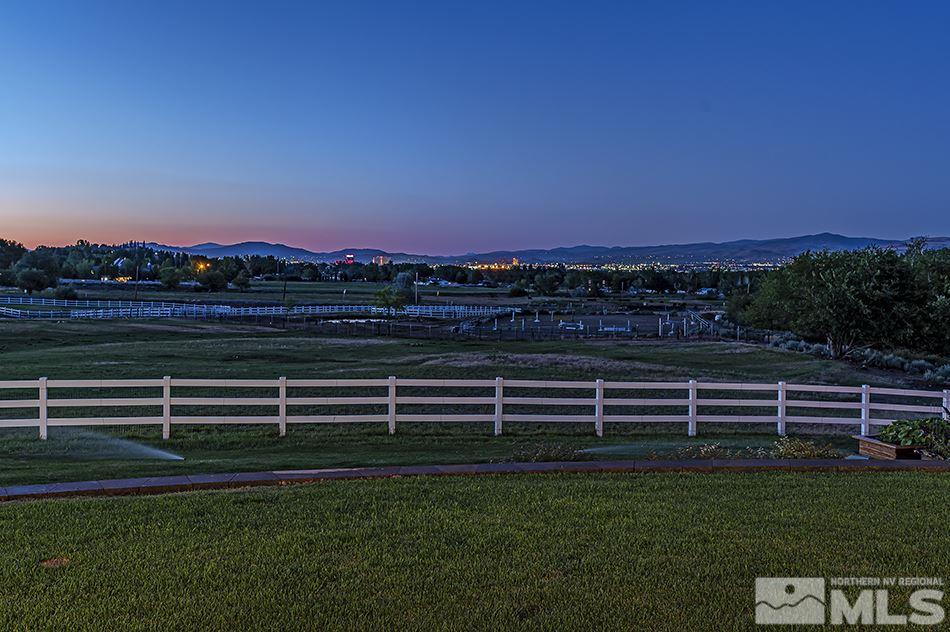 3600 Holcomb Ranch Lane Reno, NV 89511 - Photo 29 of 38 a view of a green field with sunset view