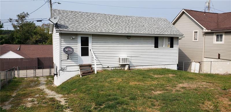 3008 Turk Street Claridge, PA 15623 - Photo 16 of 16 Backyard view! Completely fenced in with access out from Primary Bedroom!