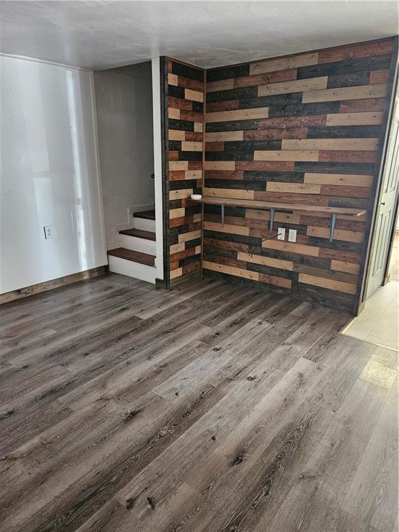3008 Turk Street Claridge, PA 15623 - Photo 5 of 16 Luxury vinyl flooring in Living room with accent wall
