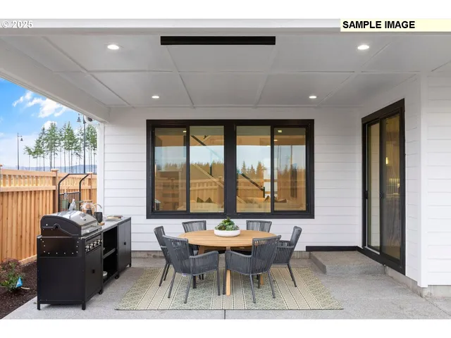 a view of a pathway with a garden