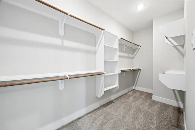 a view of an empty walk in closet