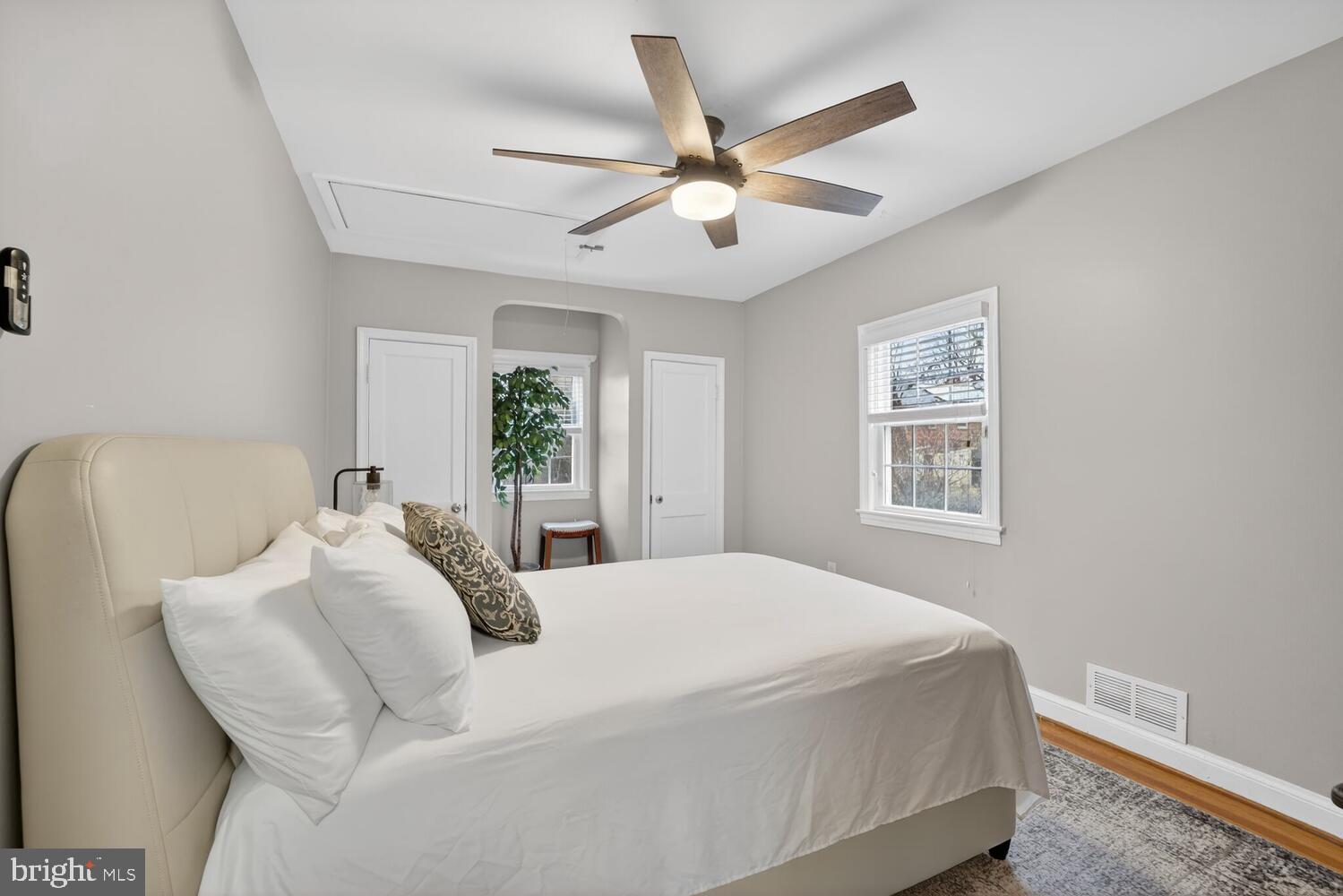 1432 35th Street Southeast Washington, DC 20020 - Photo 19 of 36 a bedroom with a bed and a large window