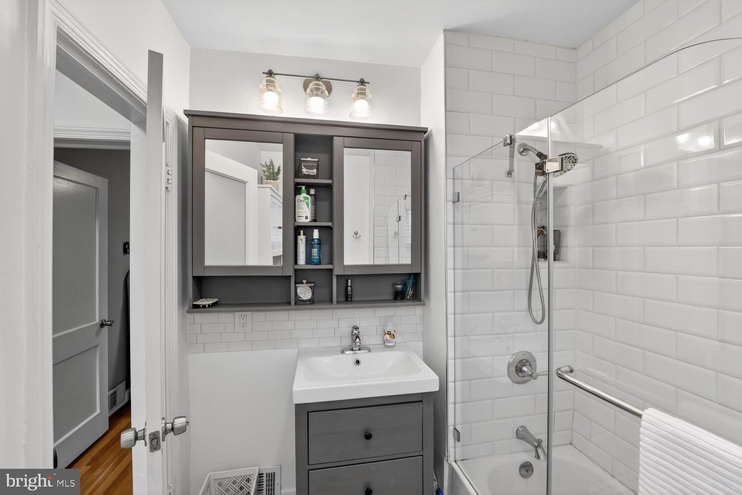 1432 35th Street Southeast Washington, DC 20020 - Photo 20 of 36 a bathroom with a sink a toilet and shower