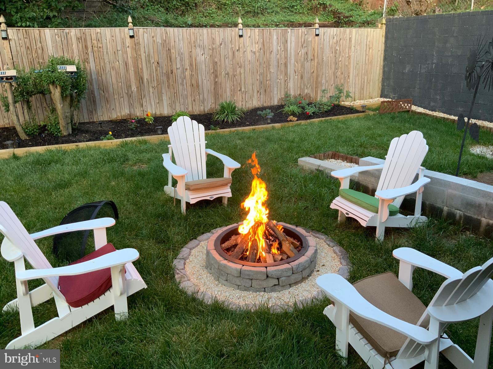 1432 35th Street Southeast Washington, DC 20020 - Photo 28 of 36 a view of a backyard with table and chairs