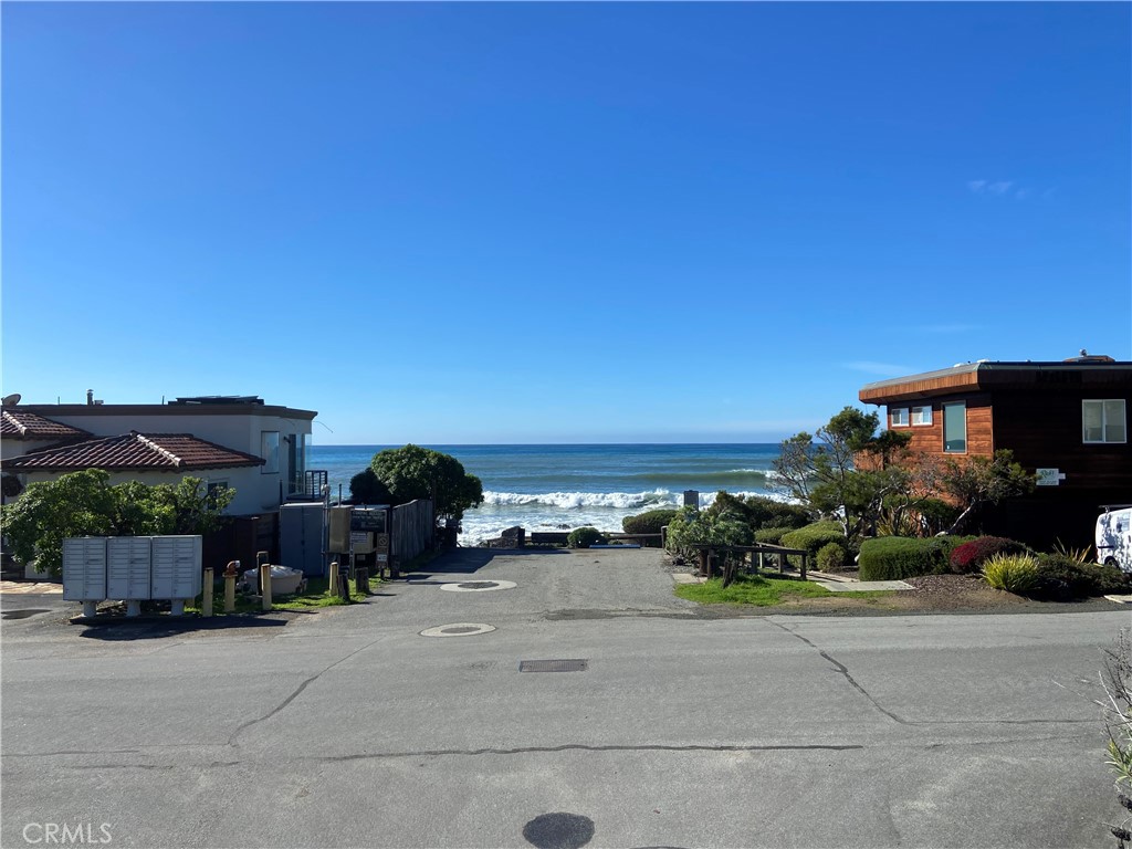 395 Ivar Street Cambria, CA 93428 - Photo 12 of 21 a view of a house with a street