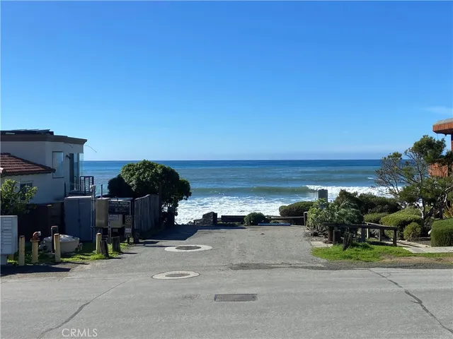 a view of a street with an outdoor space