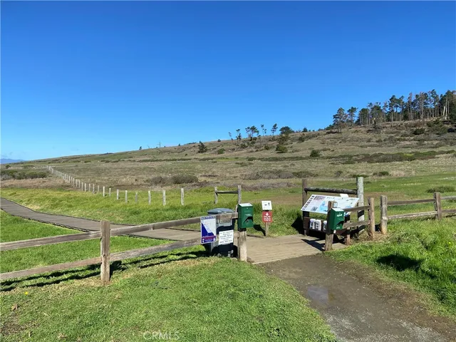 a view of a dinning table and chairs in the patio