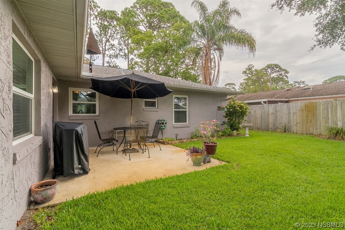 2828 Pine Tree Drive Edgewater, FL 32141 - Photo 29 of 38 a view of outdoor space yard and patio
