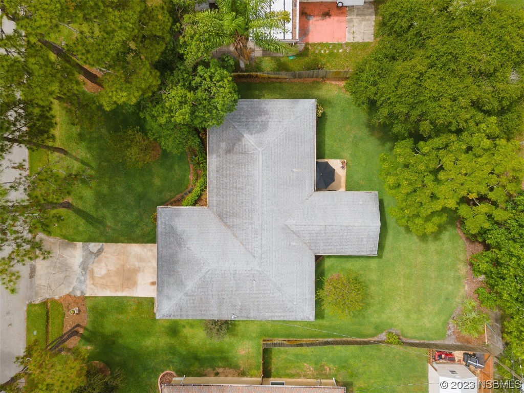 2828 Pine Tree Drive Edgewater, FL 32141 - Photo 32 of 38 an aerial view of a house with a yard