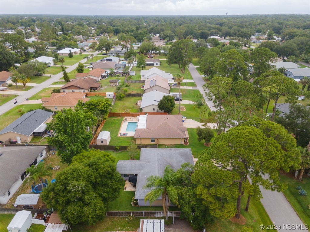 2828 Pine Tree Drive Edgewater, FL 32141 - Photo 37 of 38 an aerial view of residential houses with outdoor space