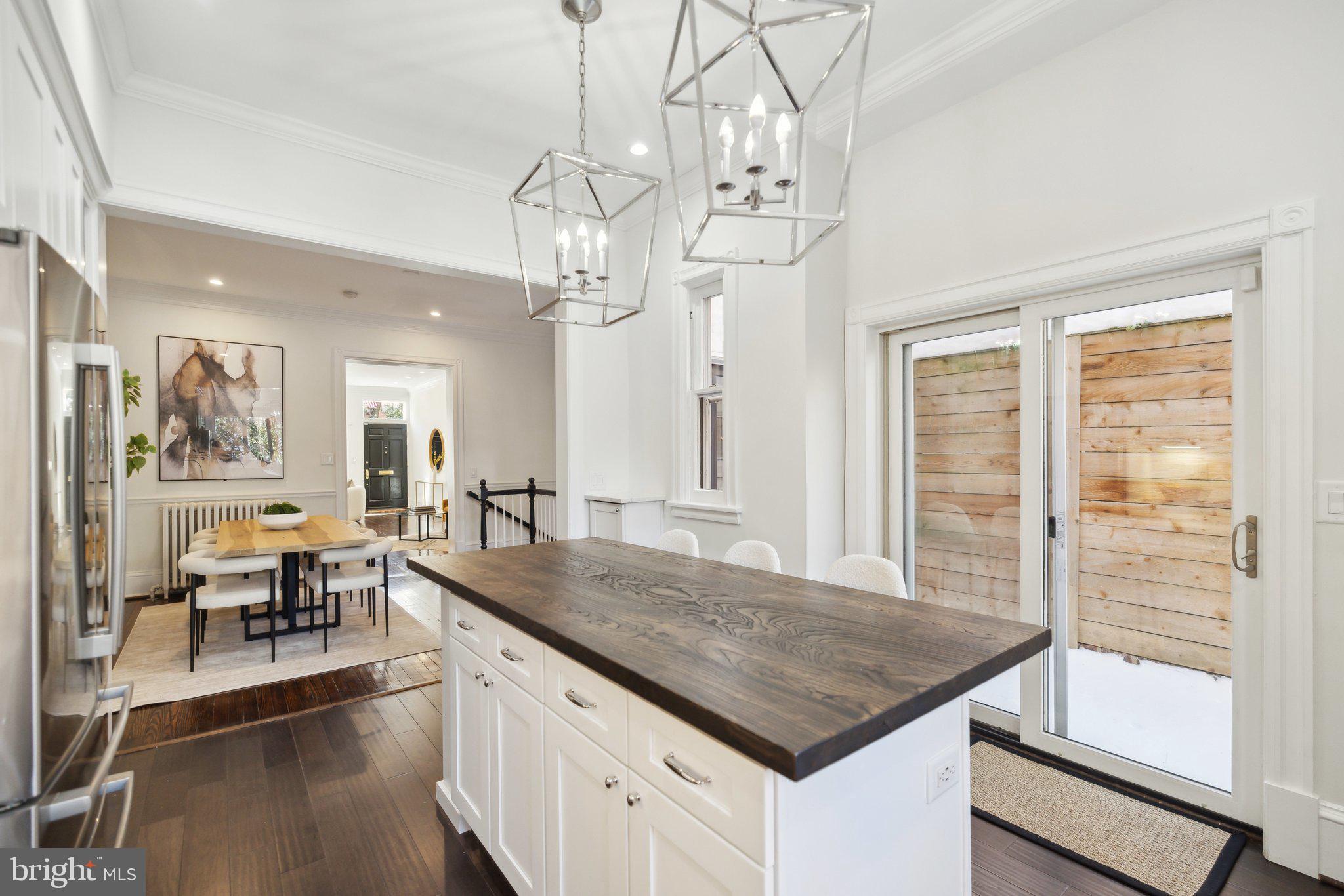 1527 31st Street Northwest Washington, DC 20007 - Photo 11 of 29 a kitchen with sink and view of living room