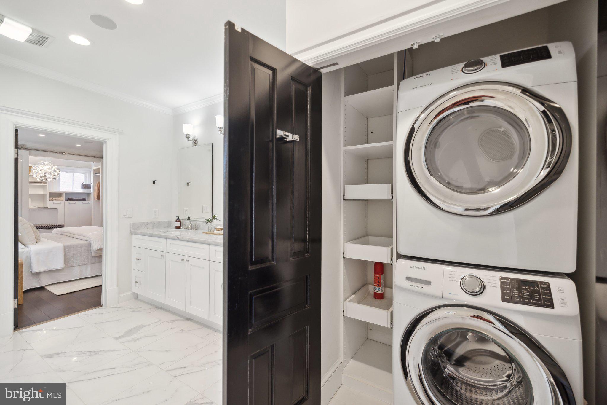 1527 31st Street Northwest Washington, DC 20007 - Photo 18 of 29 a view of a hallway with washer and dryer