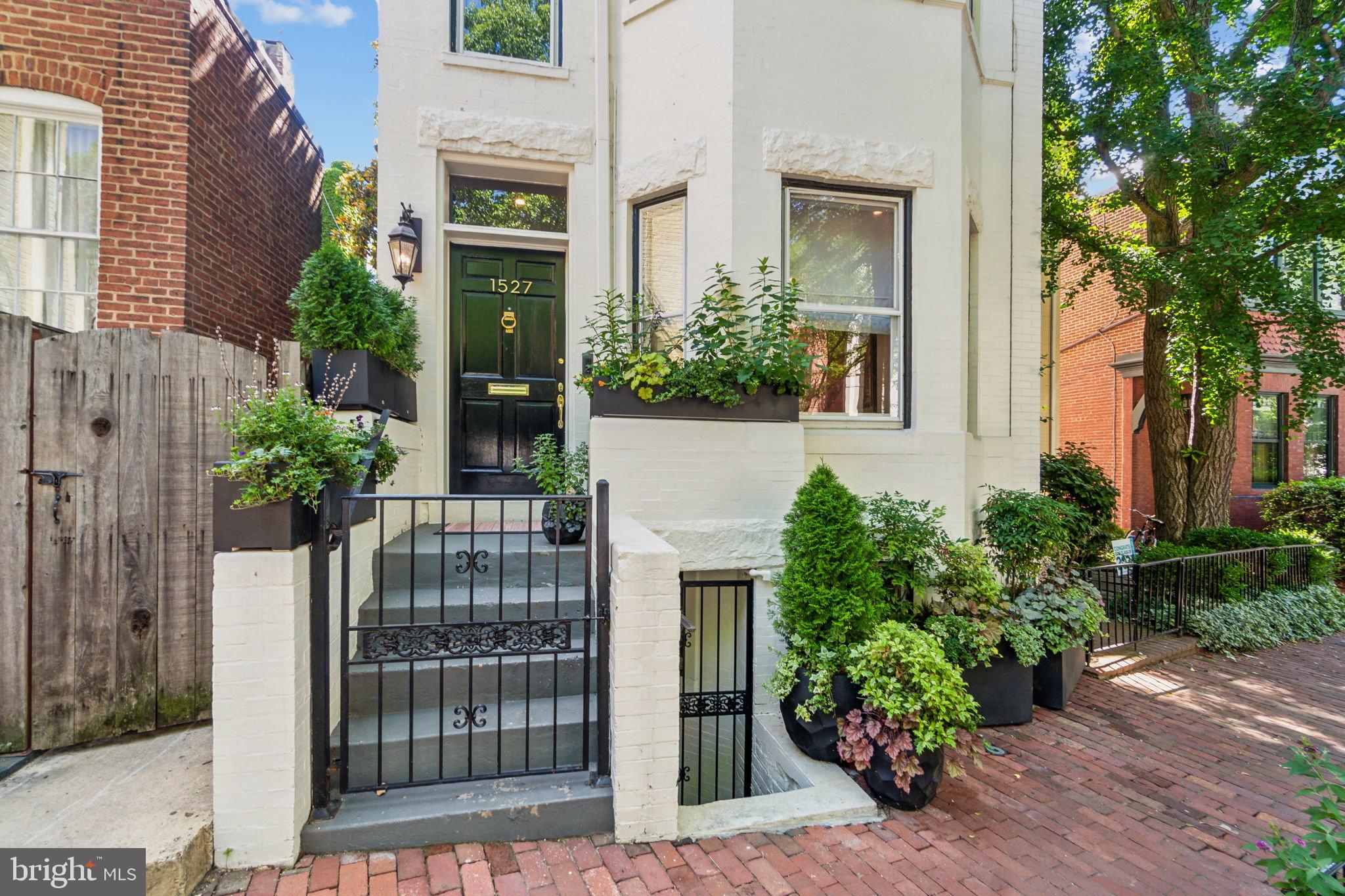 1527 31st Street Northwest Washington, DC 20007 - Photo 2 of 29 front view of a house with a glass door