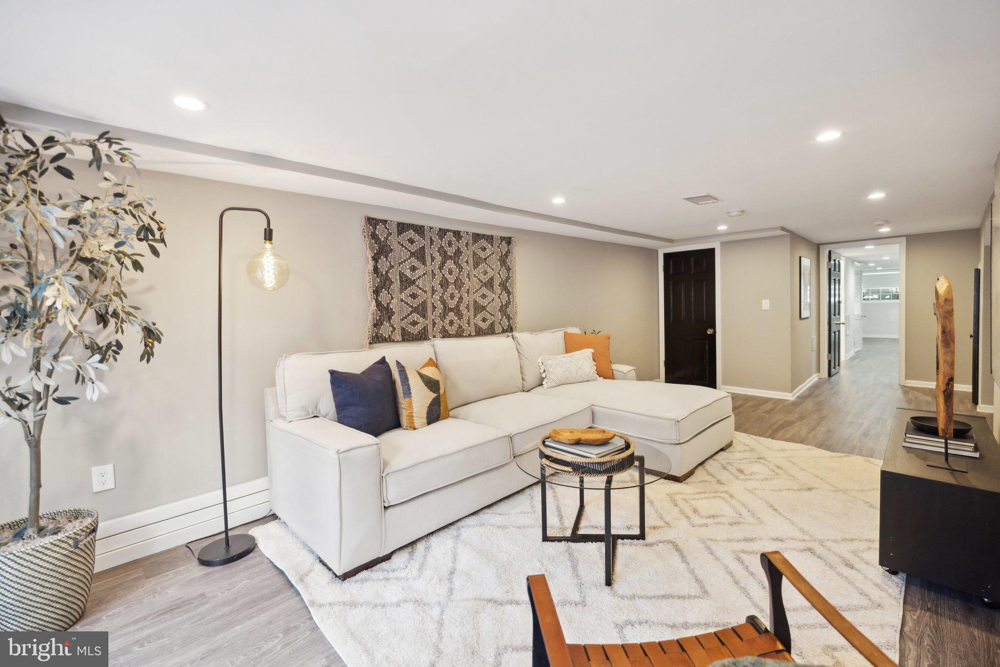 1527 31st Street Northwest Washington, DC 20007 - Photo 24 of 29 a living room with furniture and view of kitchen