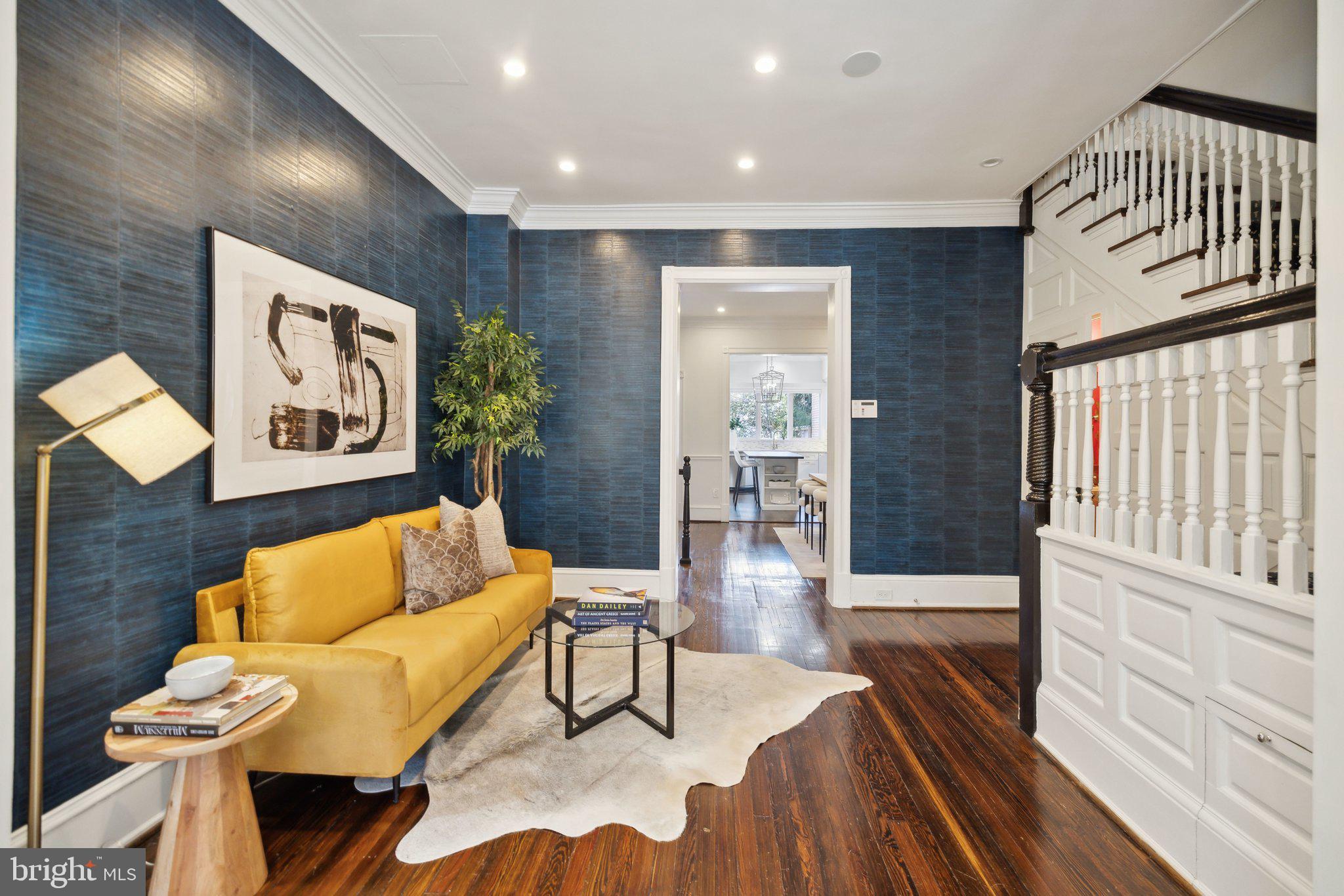 1527 31st Street Northwest Washington, DC 20007 - Photo 5 of 29 a living room with furniture and a wooden floor