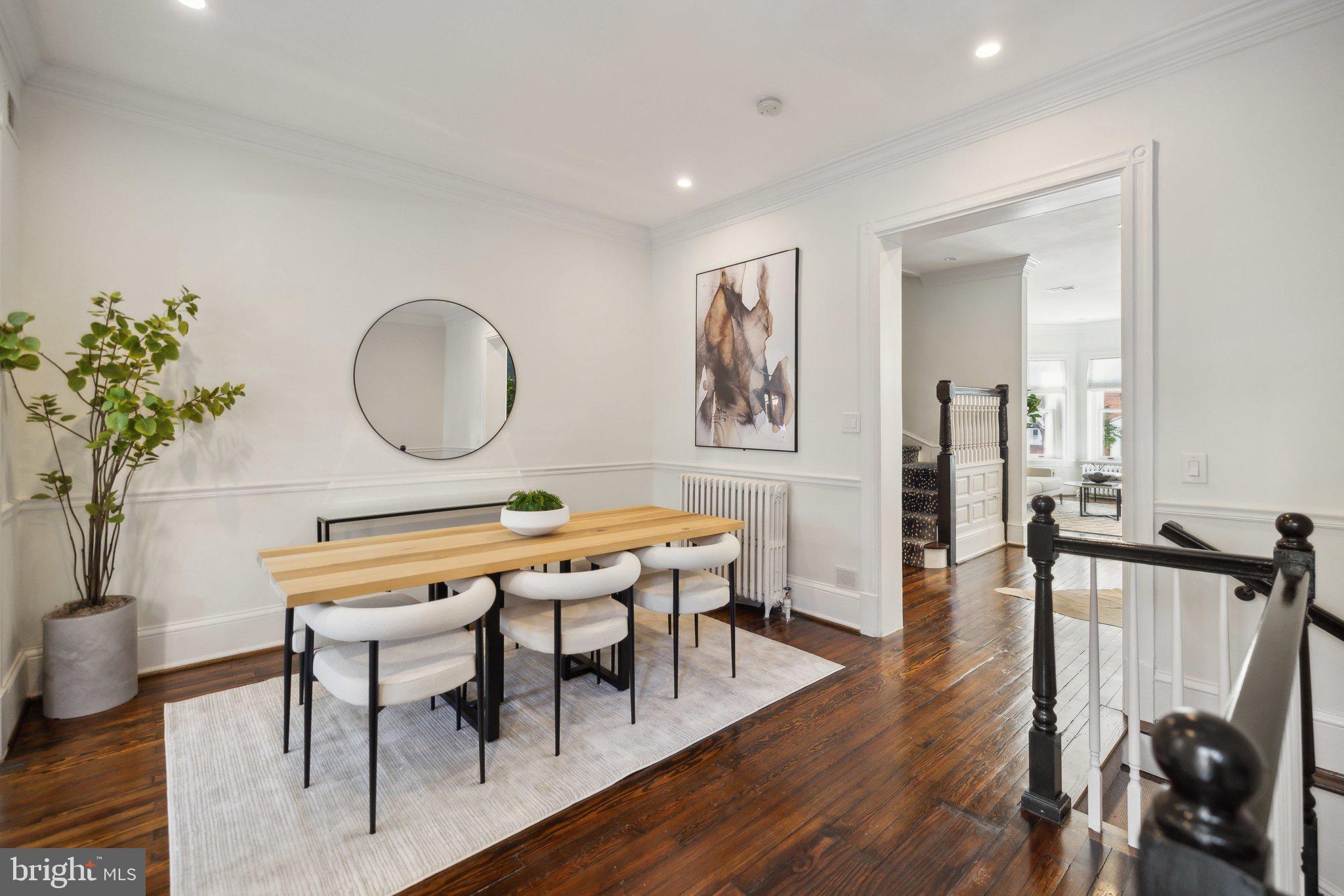 1527 31st Street Northwest Washington, DC 20007 - Photo 7 of 29 a view of a dining room with furniture and wooden floor
