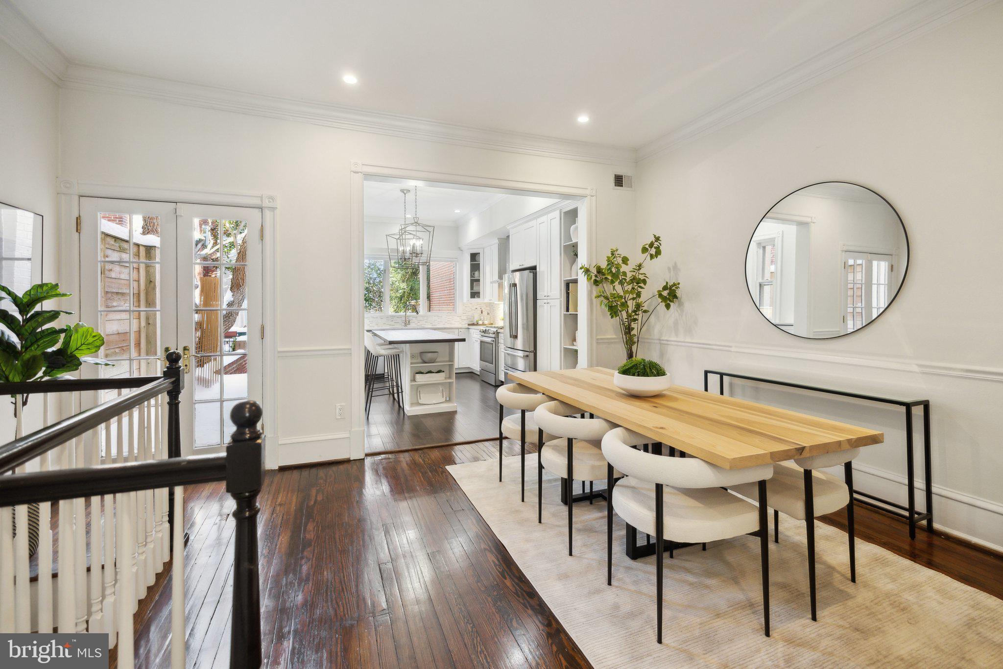 1527 31st Street Northwest Washington, DC 20007 - Photo 8 of 29 a view of a dining room with furniture window and wooden floor