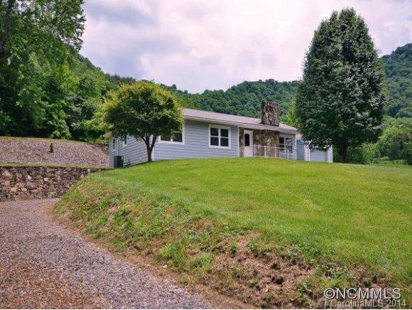 3964 Liner Creek Road Clyde, NC 28721 - Photo 1 of 17 a view of a house with a yard