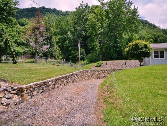3964 Liner Creek Road Clyde, NC 28721 - Photo 12 of 17 a view of a park with large trees