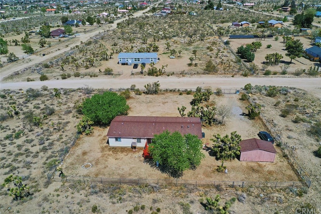 1337 Mono Road Pinon Hills, CA 92372 - Photo 1 of 1 an aerial view of a house with a yard
