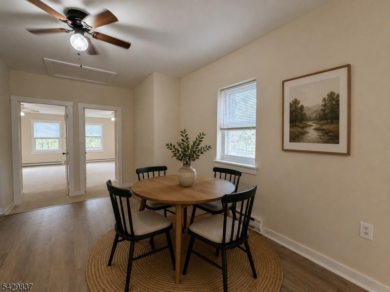 6 Southard Road, Unit 2 Mount Arlington, NJ 07856 - Photo 4 of 10 a dining room with furniture and window