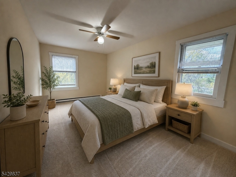 6 Southard Road, Unit 2 Mount Arlington, NJ 07856 - Photo 6 of 10 a bedroom with a bed and window