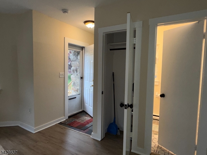 6 Southard Road, Unit 2 Mount Arlington, NJ 07856 - Photo 9 of 10 wooden floor in an empty room and a gallery