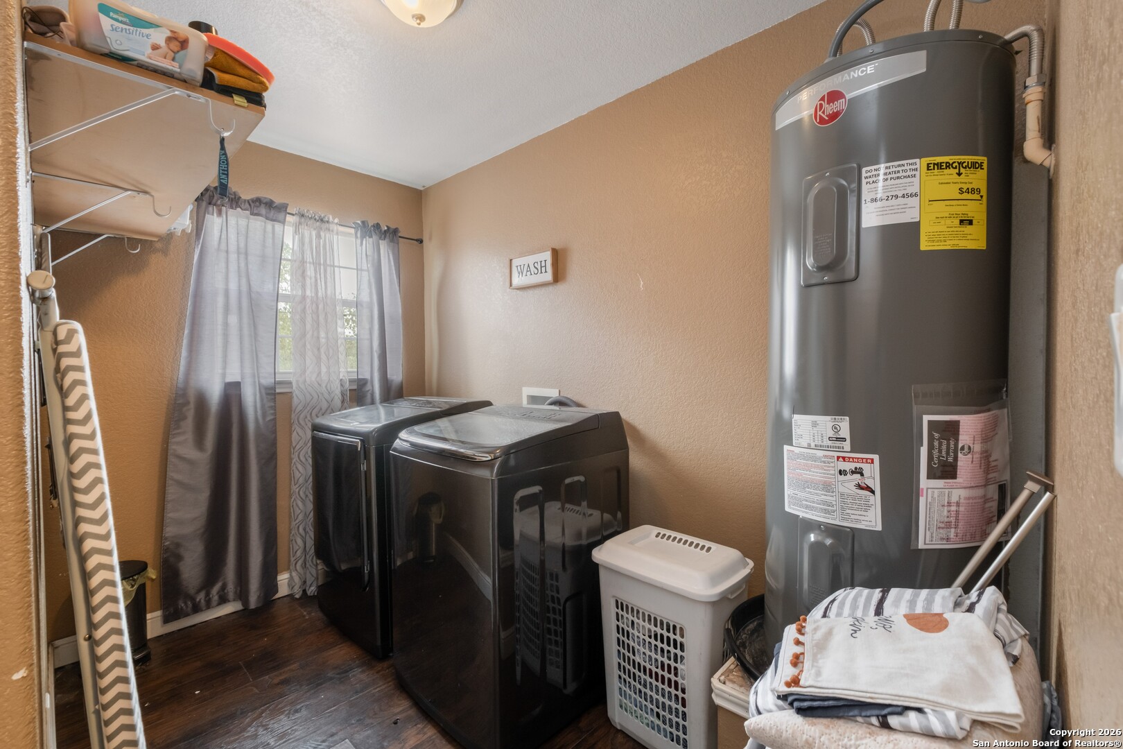 1655 Eichman Road Poteet, TX 78065 - Photo 28 of 45 a utility room with dryer and washer