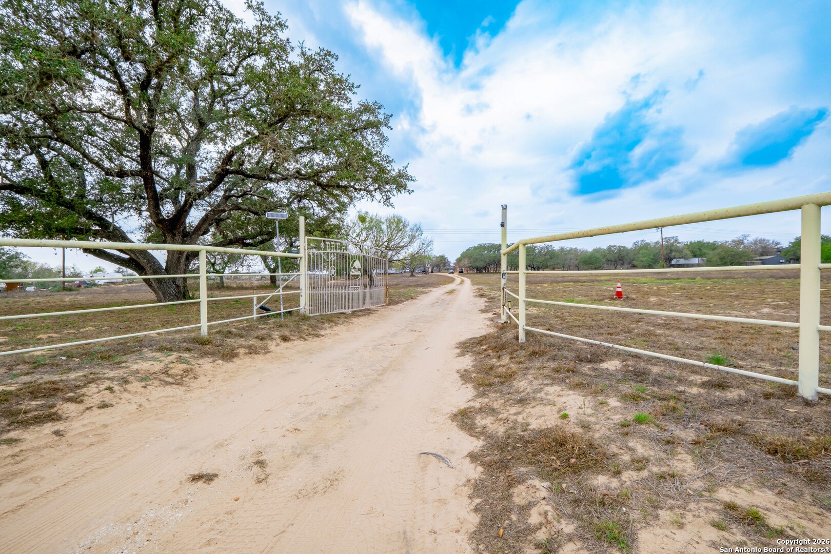 1655 Eichman Road Poteet, TX 78065 - Photo 33 of 45 a view of a yard with wooden fence