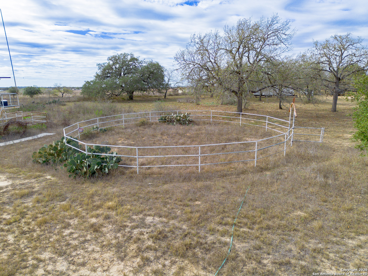 1655 Eichman Road Poteet, TX 78065 - Photo 36 of 45 a view of a yard with wooden fence