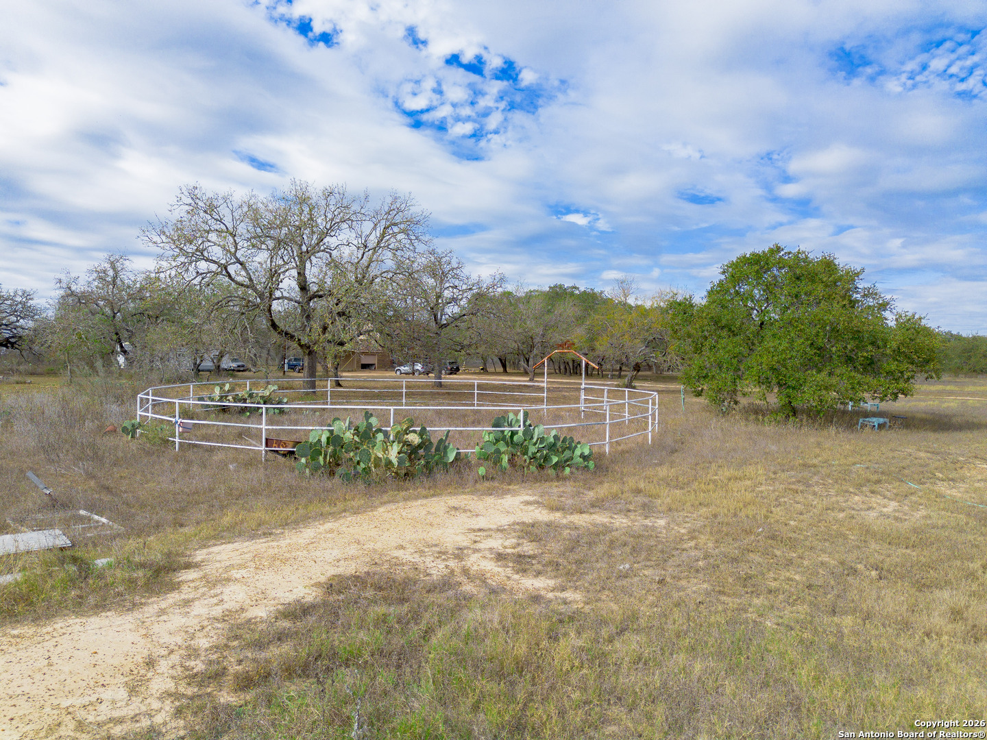 1655 Eichman Road Poteet, TX 78065 - Photo 37 of 45 a view of a garden with a bench