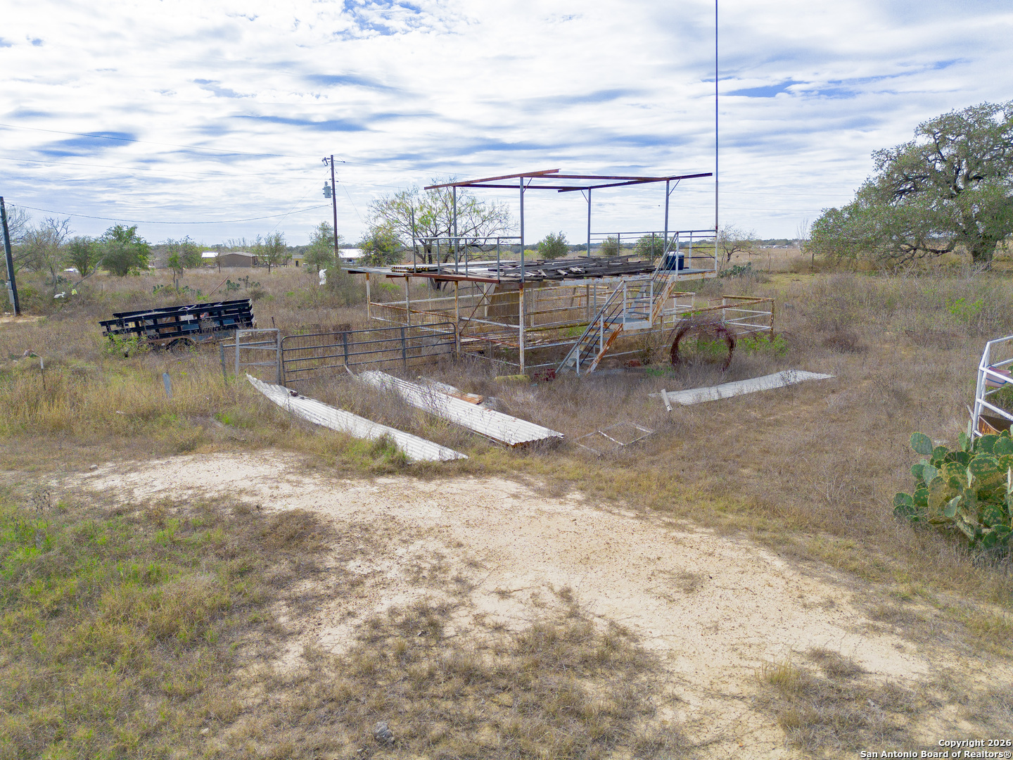 1655 Eichman Road Poteet, TX 78065 - Photo 38 of 45 a view of a lake with beach