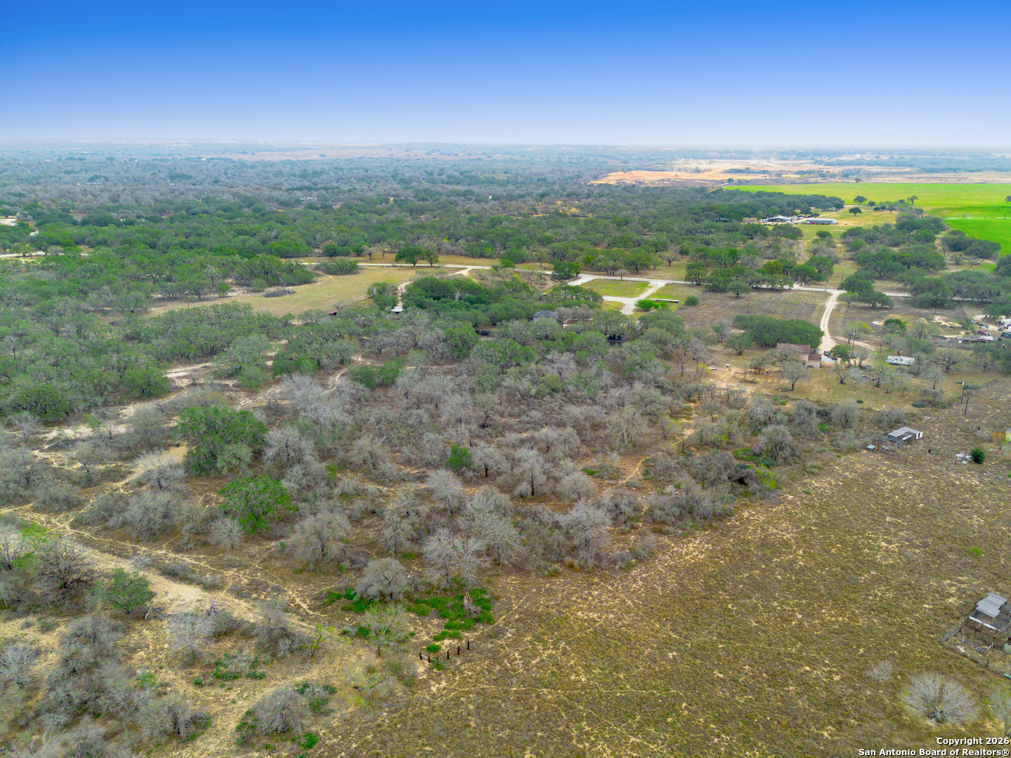1655 Eichman Road Poteet, TX 78065 - Photo 43 of 45 a view of a city with lush green forest