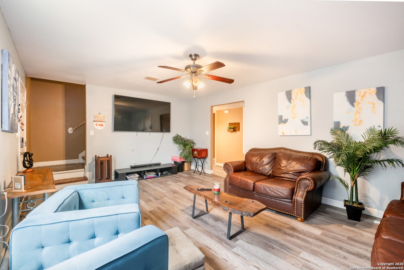 1655 Eichman Road Poteet, TX 78065 - Photo 7 of 45 a living room with furniture and a flat screen tv