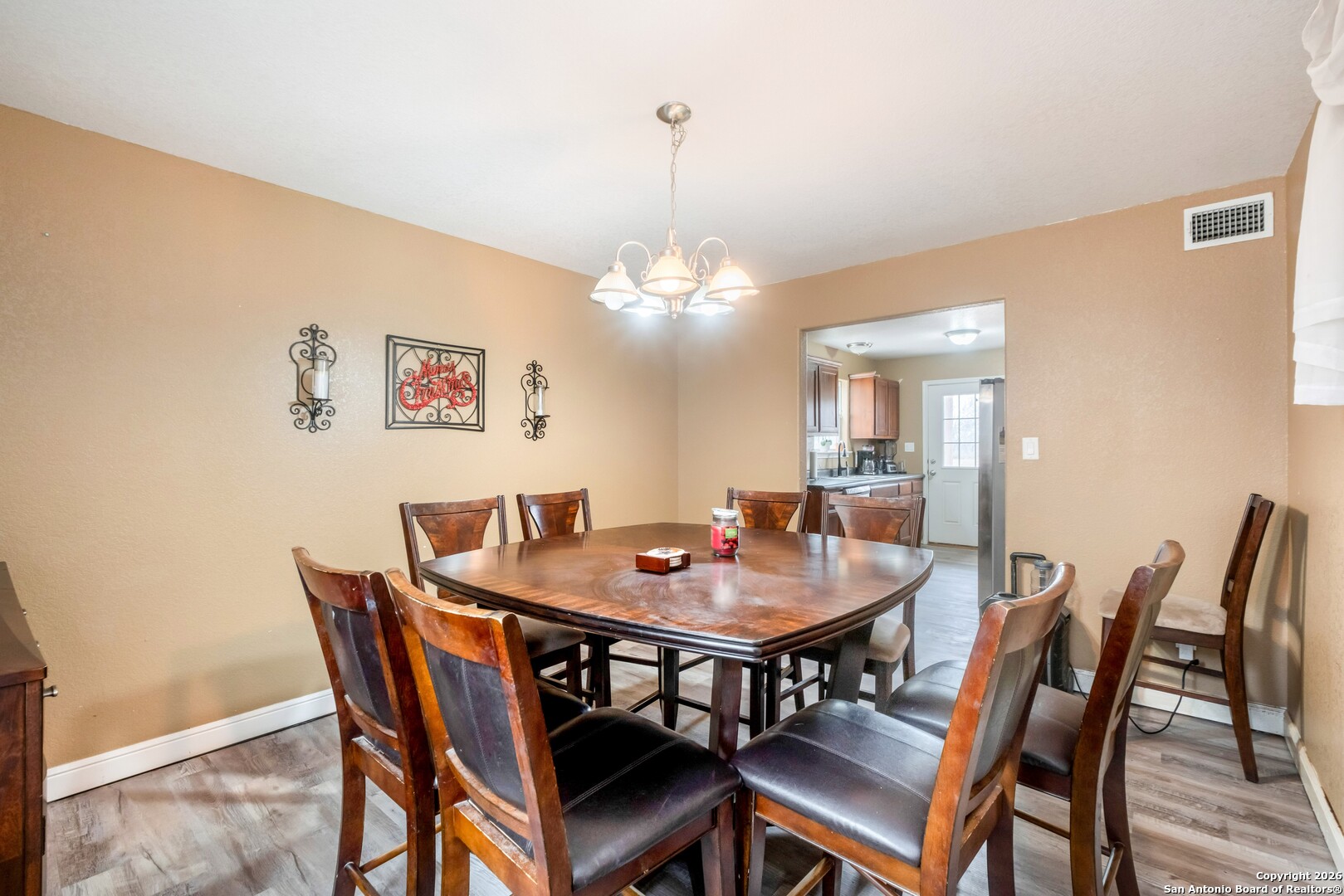 1655 Eichman Road Poteet, TX 78065 - Photo 10 of 45 a dining room with furniture and window