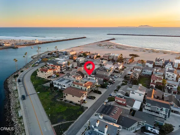 an aerial view of beach and ocean