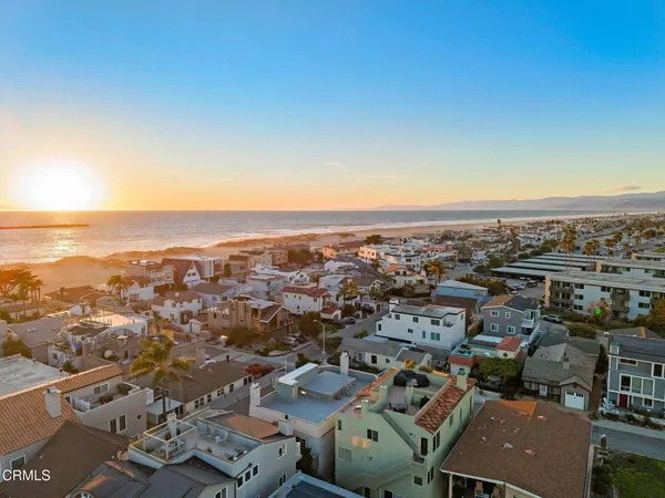 an aerial view of a ocean beach and ocean view
