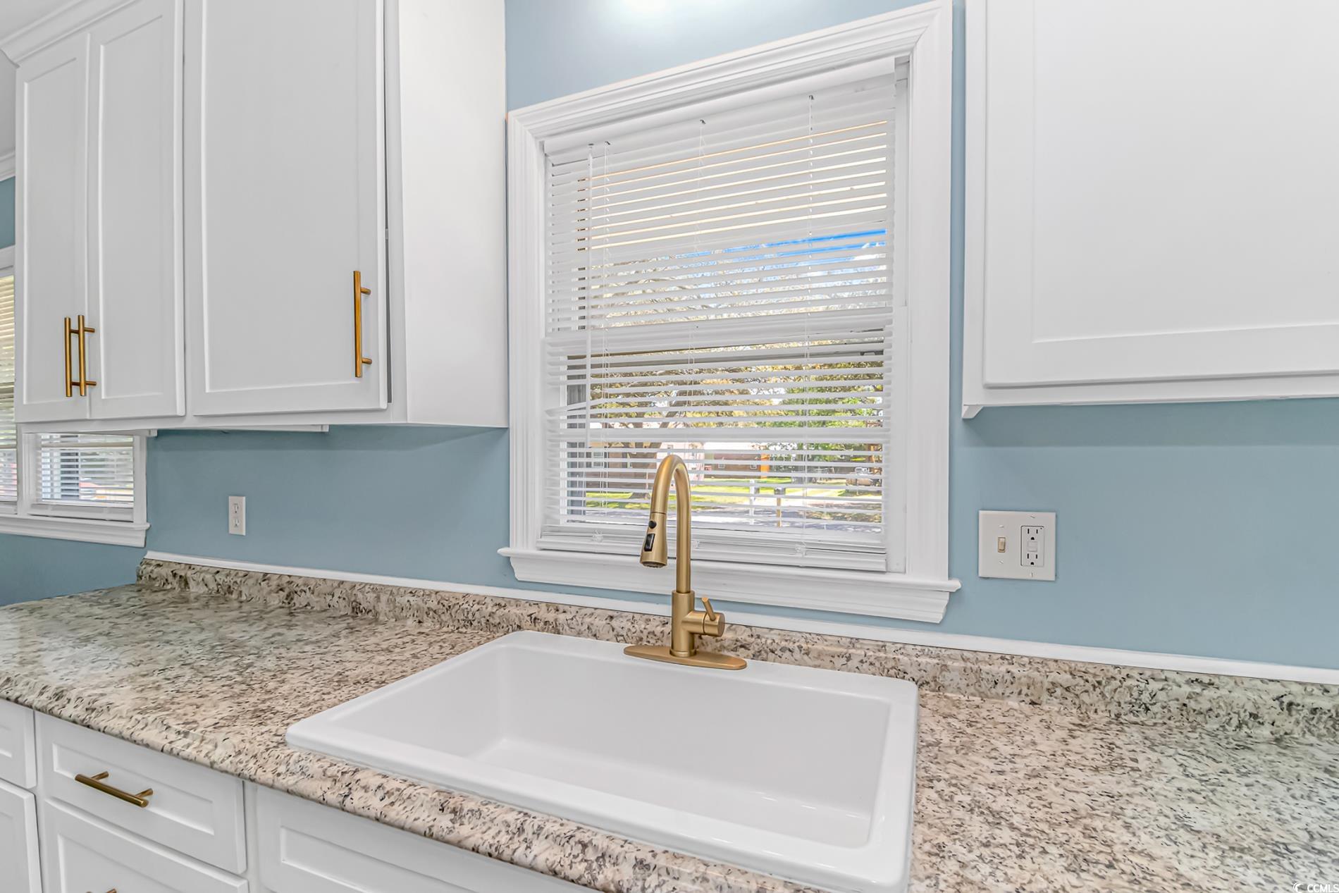 1931 Jasper Street Georgetown, SC 29440 - Photo 13 of 30 Room details featuring a sink and white cabinets
