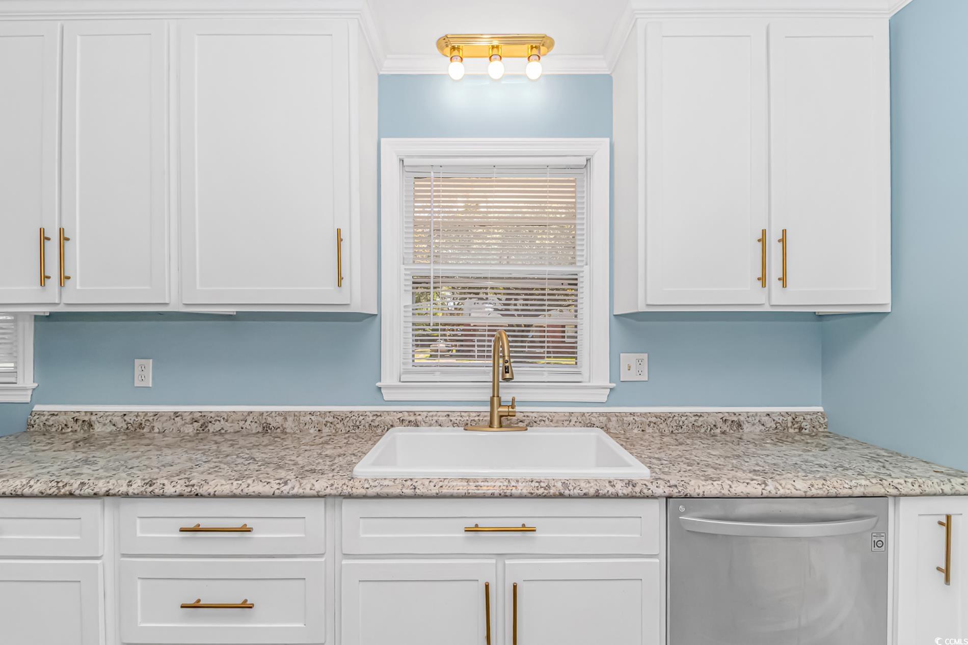 1931 Jasper Street Georgetown, SC 29440 - Photo 14 of 30 Kitchen featuring white cabinets, ornamental moldi