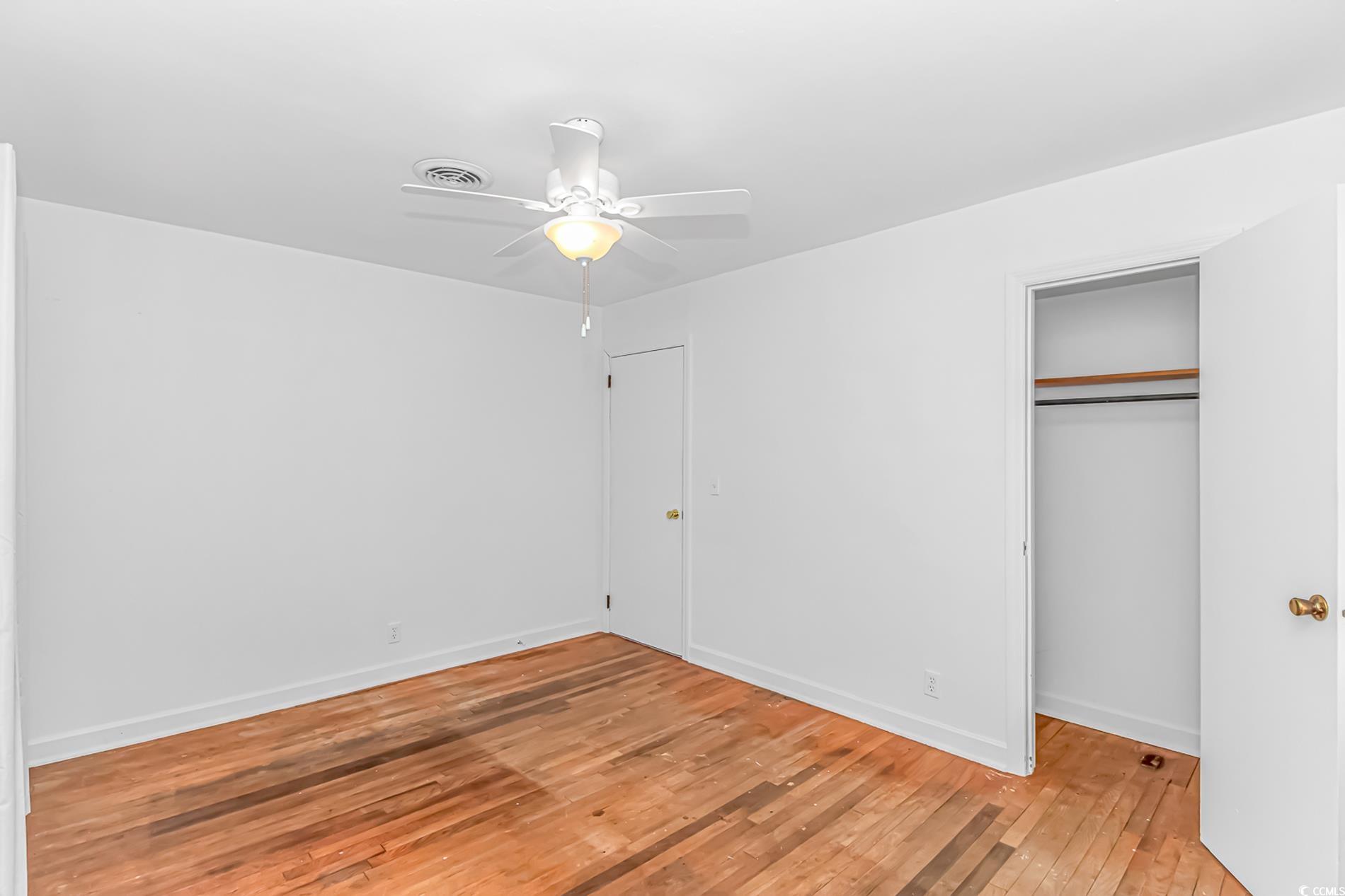1931 Jasper Street Georgetown, SC 29440 - Photo 17 of 30 Unfurnished bedroom featuring light wood-style flo