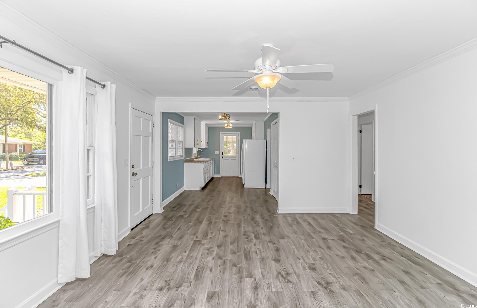 1931 Jasper Street Georgetown, SC 29440 - Photo 8 of 30 Unfurnished living room with ceiling fan, baseboar