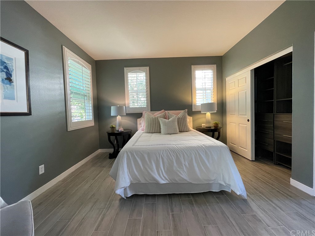 21 Thorp Ladera Ranch Ladera Ranch, CA 92694 - Photo 11 of 15 a bedroom with a bed and a window