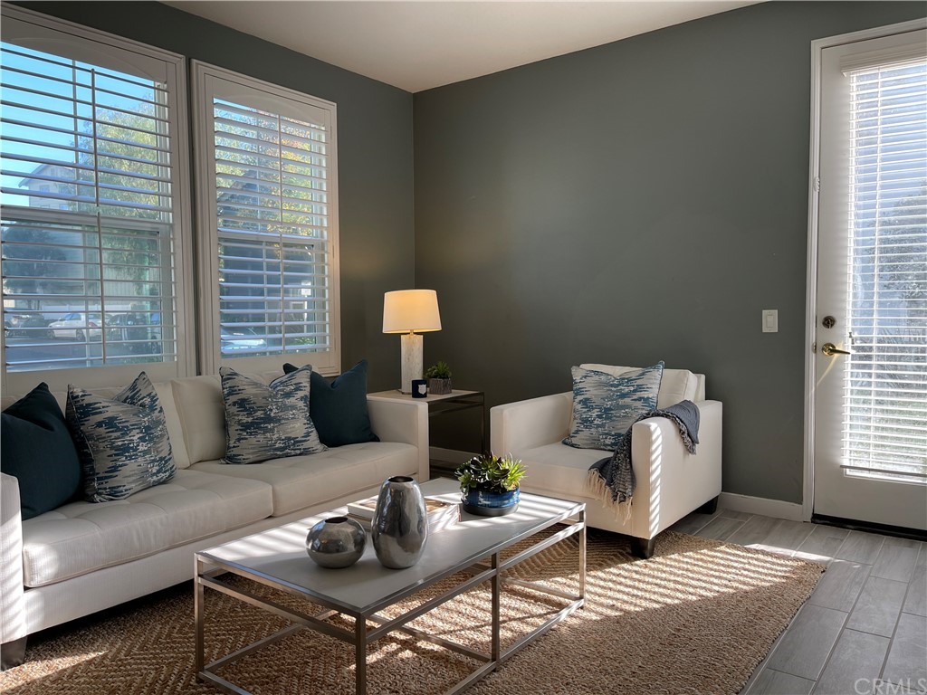 21 Thorp Ladera Ranch Ladera Ranch, CA 92694 - Photo 4 of 15 a living room with furniture and a window