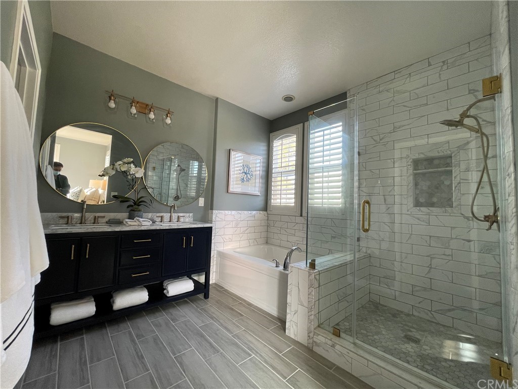 21 Thorp Ladera Ranch Ladera Ranch, CA 92694 - Photo 5 of 15 a bathroom with a sink a vanity and a mirror